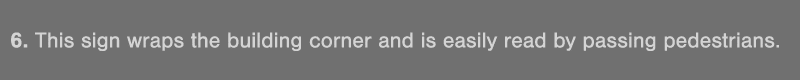 6  This sign wraps the building corner and is easily read by passing pedestrians 